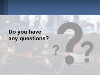 A Group Of People Sitting In Front Of A Stage PowerPoint Template