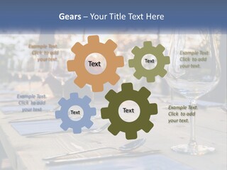 A Table Topped With Wine Glasses And Place Settings PowerPoint Template
