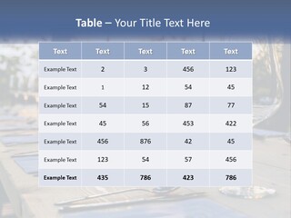 A Table Topped With Wine Glasses And Place Settings PowerPoint Template
