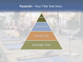 A Table Topped With Wine Glasses And Place Settings PowerPoint Template