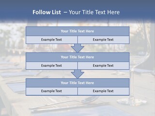 A Table Topped With Wine Glasses And Place Settings PowerPoint Template