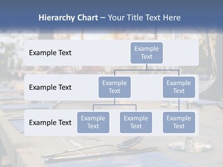 A Table Topped With Wine Glasses And Place Settings PowerPoint Template