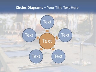 A Table Topped With Wine Glasses And Place Settings PowerPoint Template