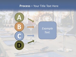 A Table Topped With Wine Glasses And Place Settings PowerPoint Template