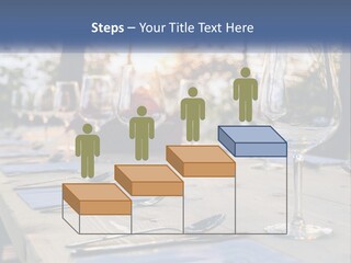 A Table Topped With Wine Glasses And Place Settings PowerPoint Template