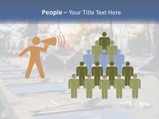 A Table Topped With Wine Glasses And Place Settings PowerPoint Template