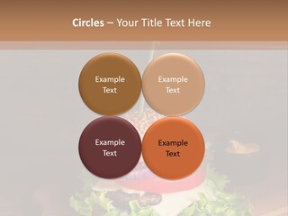 A Hamburger With Lettuce, Tomato, Onion And Cheese On A Cutting Board PowerPoint Template