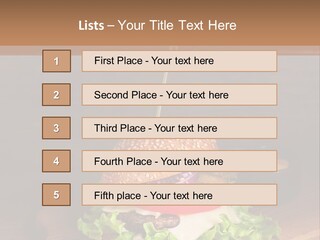 A Hamburger With Lettuce, Tomato, Onion And Cheese On A Cutting Board PowerPoint Template