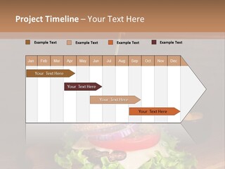 A Hamburger With Lettuce, Tomato, Onion And Cheese On A Cutting Board PowerPoint Template