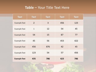 A Hamburger With Lettuce, Tomato, Onion And Cheese On A Cutting Board PowerPoint Template