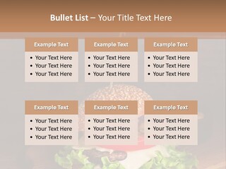 A Hamburger With Lettuce, Tomato, Onion And Cheese On A Cutting Board PowerPoint Template