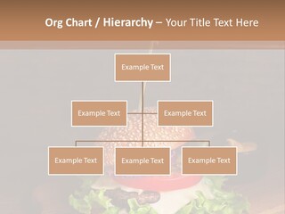 A Hamburger With Lettuce, Tomato, Onion And Cheese On A Cutting Board PowerPoint Template