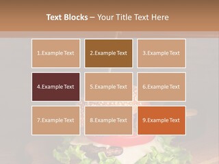 A Hamburger With Lettuce, Tomato, Onion And Cheese On A Cutting Board PowerPoint Template