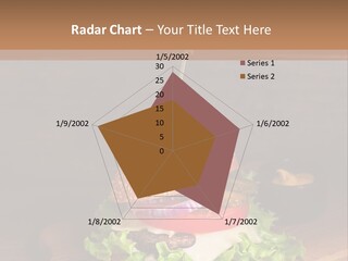 A Hamburger With Lettuce, Tomato, Onion And Cheese On A Cutting Board PowerPoint Template