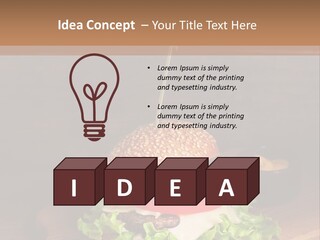 A Hamburger With Lettuce, Tomato, Onion And Cheese On A Cutting Board PowerPoint Template