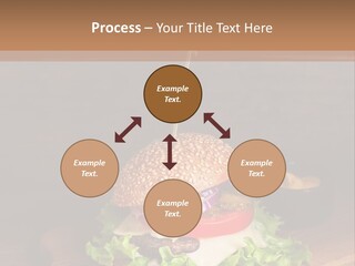 A Hamburger With Lettuce, Tomato, Onion And Cheese On A Cutting Board PowerPoint Template