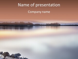 A Large Body Of Water Surrounded By Rocks PowerPoint Template