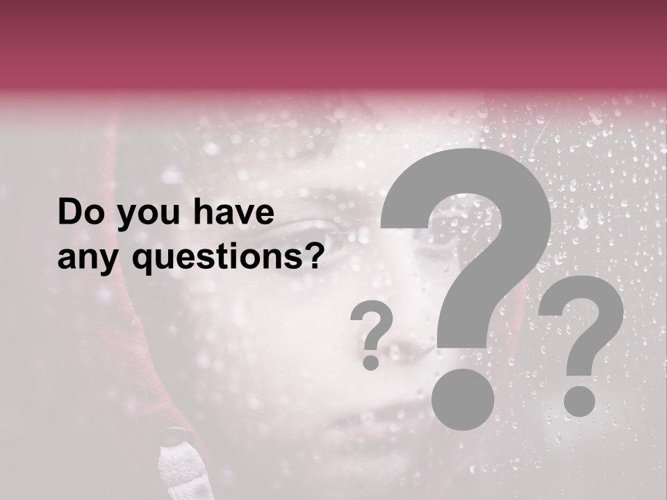 A Young Boy Looking Out Of A Window Covered In Snow PowerPoint Template