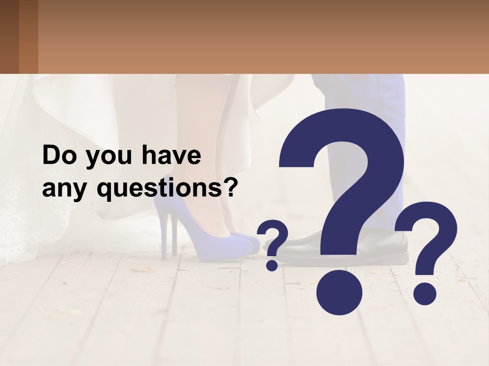 A Bride And Groom Standing Next To Each Other On A Wooden Floor PowerPoint Template