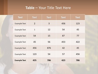 A Woman Holding A Glass Of Wine In Front Of A Vineyard PowerPoint Template