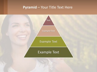 A Woman Holding A Glass Of Wine In Front Of A Vineyard PowerPoint Template