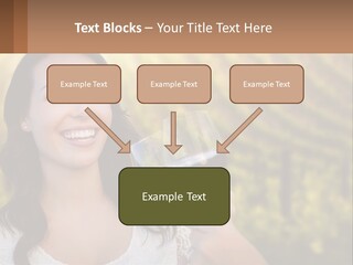 A Woman Holding A Glass Of Wine In Front Of A Vineyard PowerPoint Template
