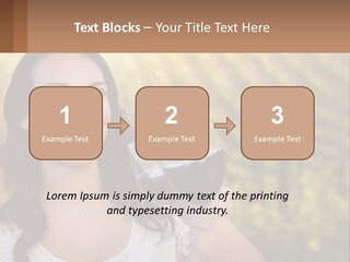 A Woman Holding A Glass Of Wine In Front Of A Vineyard PowerPoint Template