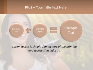 A Woman Holding A Glass Of Wine In Front Of A Vineyard PowerPoint Template