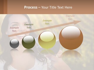 A Woman Holding A Glass Of Wine In Front Of A Vineyard PowerPoint Template