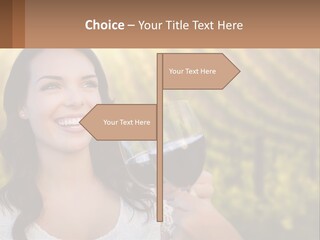 A Woman Holding A Glass Of Wine In Front Of A Vineyard PowerPoint Template