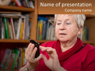 A Woman In A Red Shirt Looking At A Cell Phone PowerPoint Template