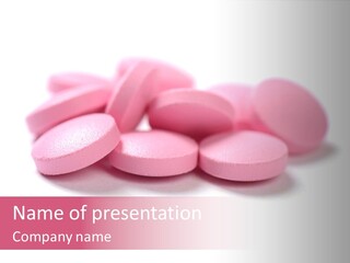 A Pile Of Pink Pills Sitting On Top Of A White Table PowerPoint Template