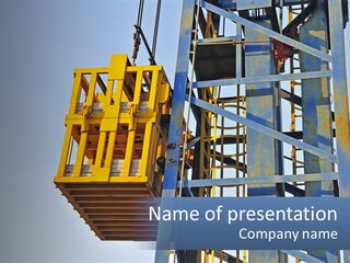 A Crane Is Lifting A Piece Of Metal PowerPoint Template