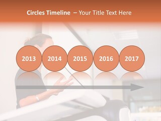 A Woman Speaking At A Podium With A Microphone PowerPoint Template