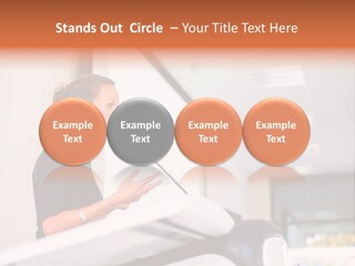 A Woman Speaking At A Podium With A Microphone PowerPoint Template