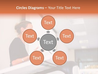 A Woman Speaking At A Podium With A Microphone PowerPoint Template