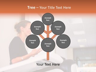 A Woman Speaking At A Podium With A Microphone PowerPoint Template