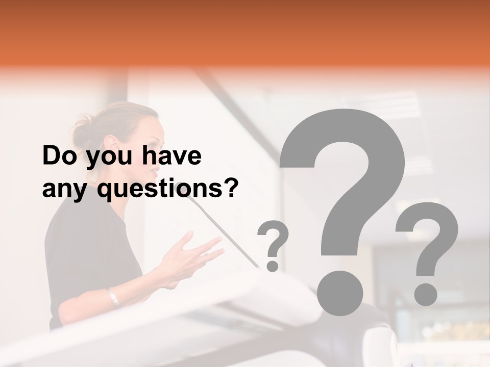 A Woman Speaking At A Podium With A Microphone PowerPoint Template