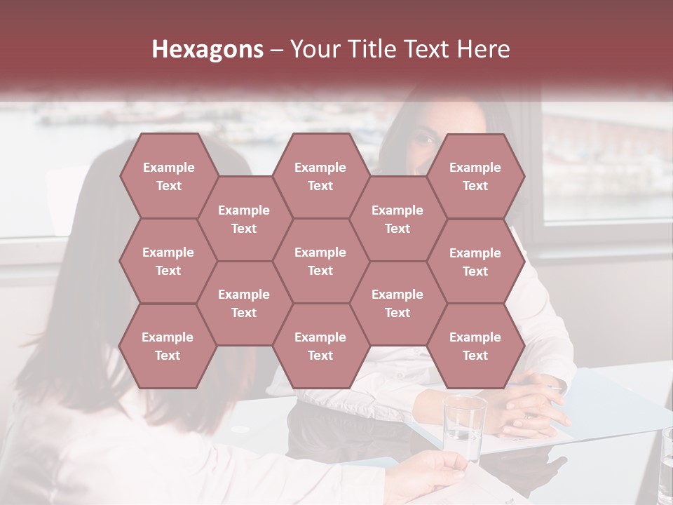 Two Women Sitting At A Table Talking To Each Other PowerPoint Template