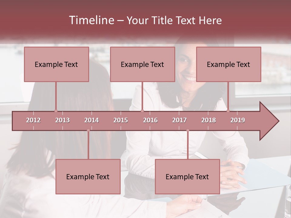 Two Women Sitting At A Table Talking To Each Other PowerPoint Template