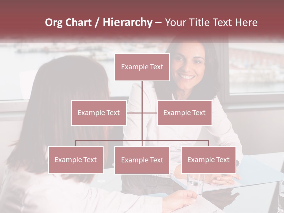 Two Women Sitting At A Table Talking To Each Other PowerPoint Template
