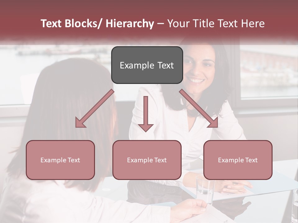 Two Women Sitting At A Table Talking To Each Other PowerPoint Template
