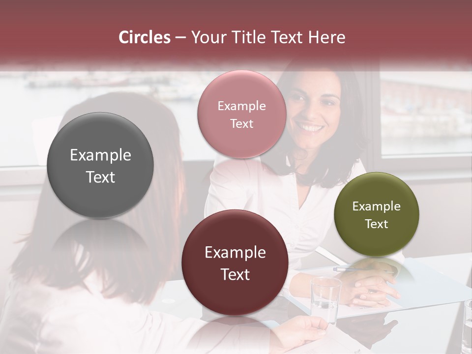 Two Women Sitting At A Table Talking To Each Other PowerPoint Template