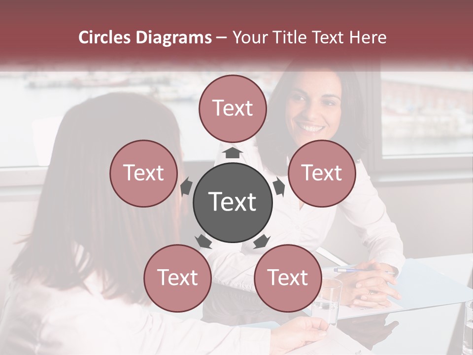 Two Women Sitting At A Table Talking To Each Other PowerPoint Template