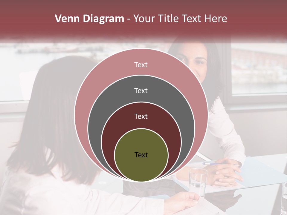 Two Women Sitting At A Table Talking To Each Other PowerPoint Template