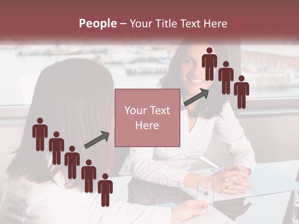 Two Women Sitting At A Table Talking To Each Other PowerPoint Template