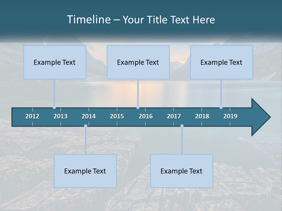 A Large Body Of Water With Mountains In The Background PowerPoint Template