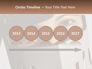 A Woman Peeking Out Of A Box With Her Eyes Wide Open PowerPoint Template