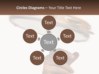 A Person's Hand Is Pointing At A Drum PowerPoint Template