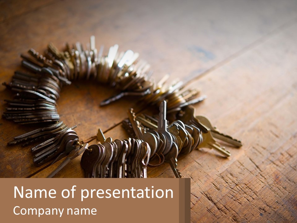 A Bunch Of Keys Arranged In A Circle On A Table PowerPoint Template